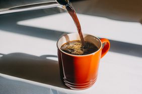 Coffee being poured into a cup.
