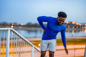 active person experiencing muscle pain and myalgia while exercising