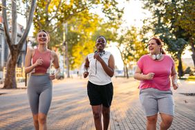 three females jogging