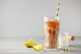 Dirty soda homemade with coconut cream, ice, and lime