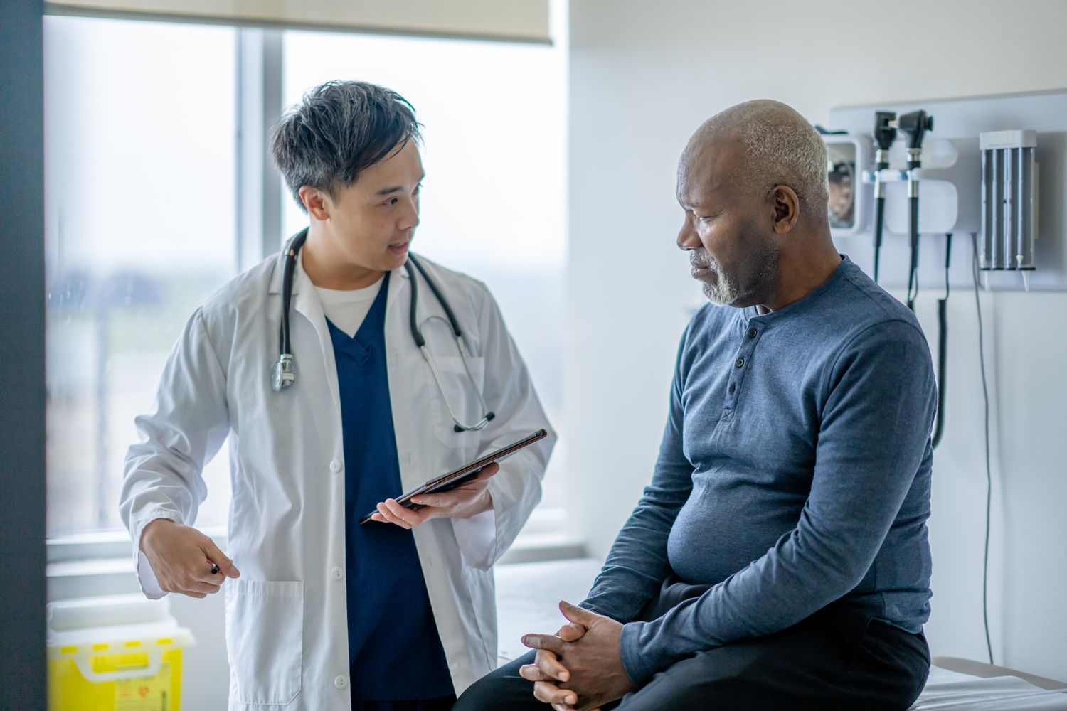 A doctor and patient talk
