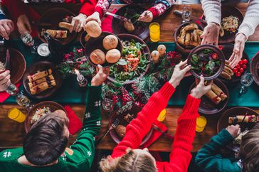A family eats during a holiday meal