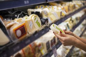 buying cheese at grocery store