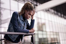 Person at work looking distressed.