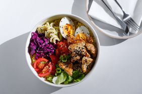 A high protein poke dish of fresh meat, raw fresh vegetables.