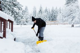 person shoveling snow