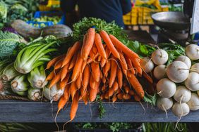 selection of wintertime vegetables including carrots and turnips