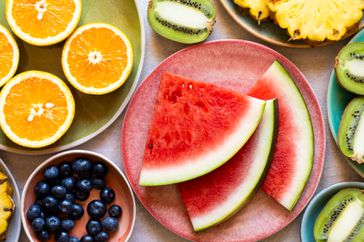 Sliced watermelon fruit, oranges, blueberry, pineapple and kiwi fruit