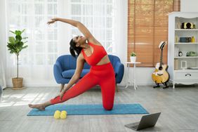 woman treating high cholesterol with exercise