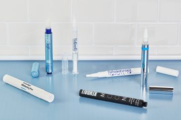 Teeth Whitening Pens laid out on a table