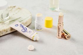A selection of lip balms from our test arranged on a countertop.