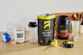Protein whey powders open on counter