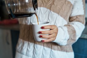 person consuming caffeine to raise blood pressure