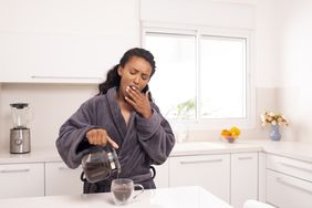 Woman pouring coffee to stay awake