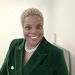 woman with a green blazer on