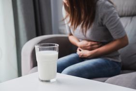 A woman suffering from lactose intolerance