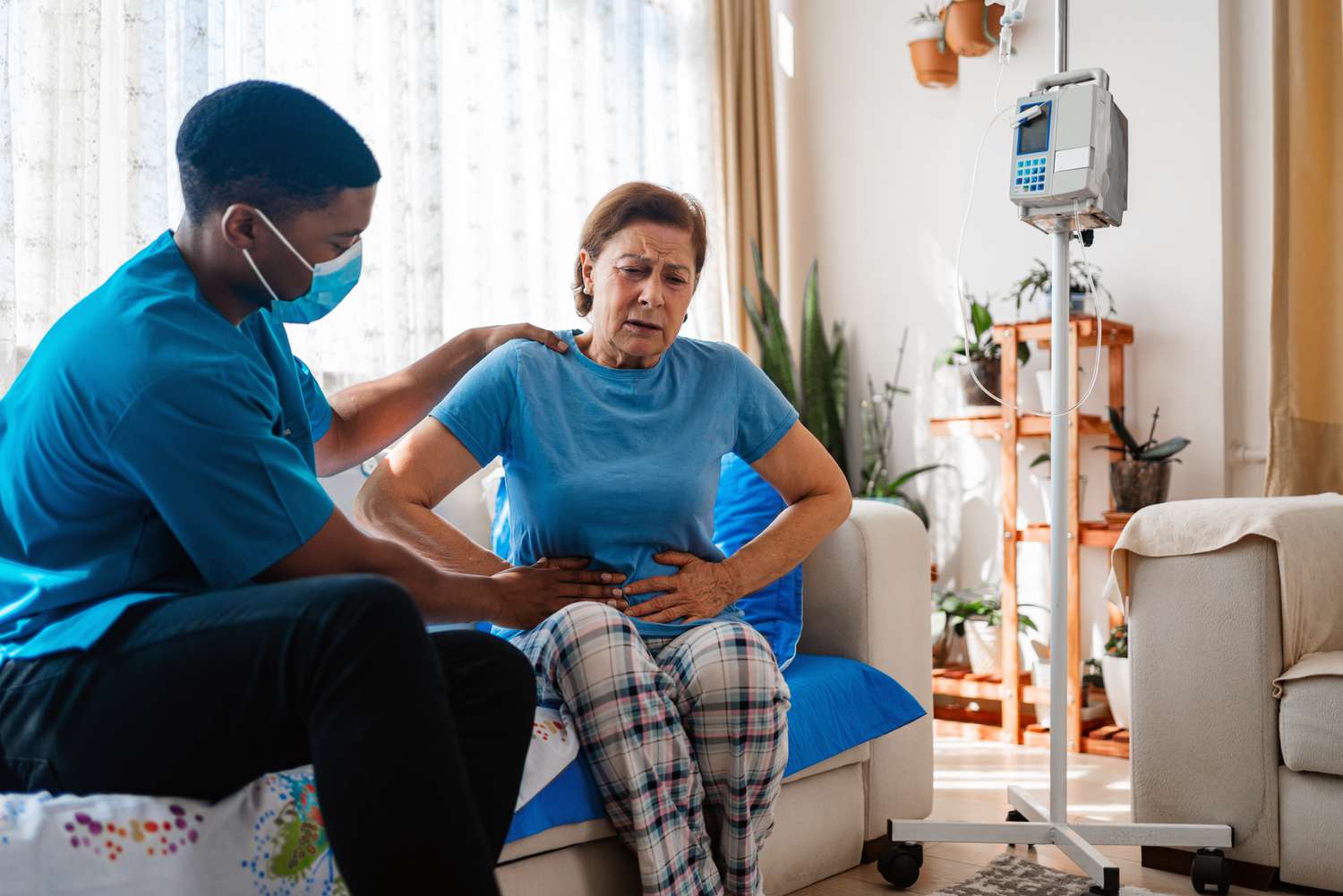 person with liver disease feeling swollen abdomen 