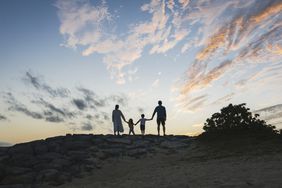 longevity. family holding hands