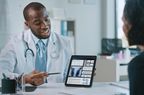 doctor showing patient lung imaging tests on ipad 