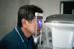 senior person getting tested for macular degeneration