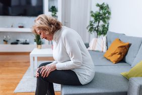 woman with may thurner syndrome experiencing leg pain