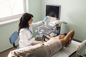 doctor using imaging scan to diagnose metastatic breast cancer