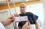 A patient using a pain scale