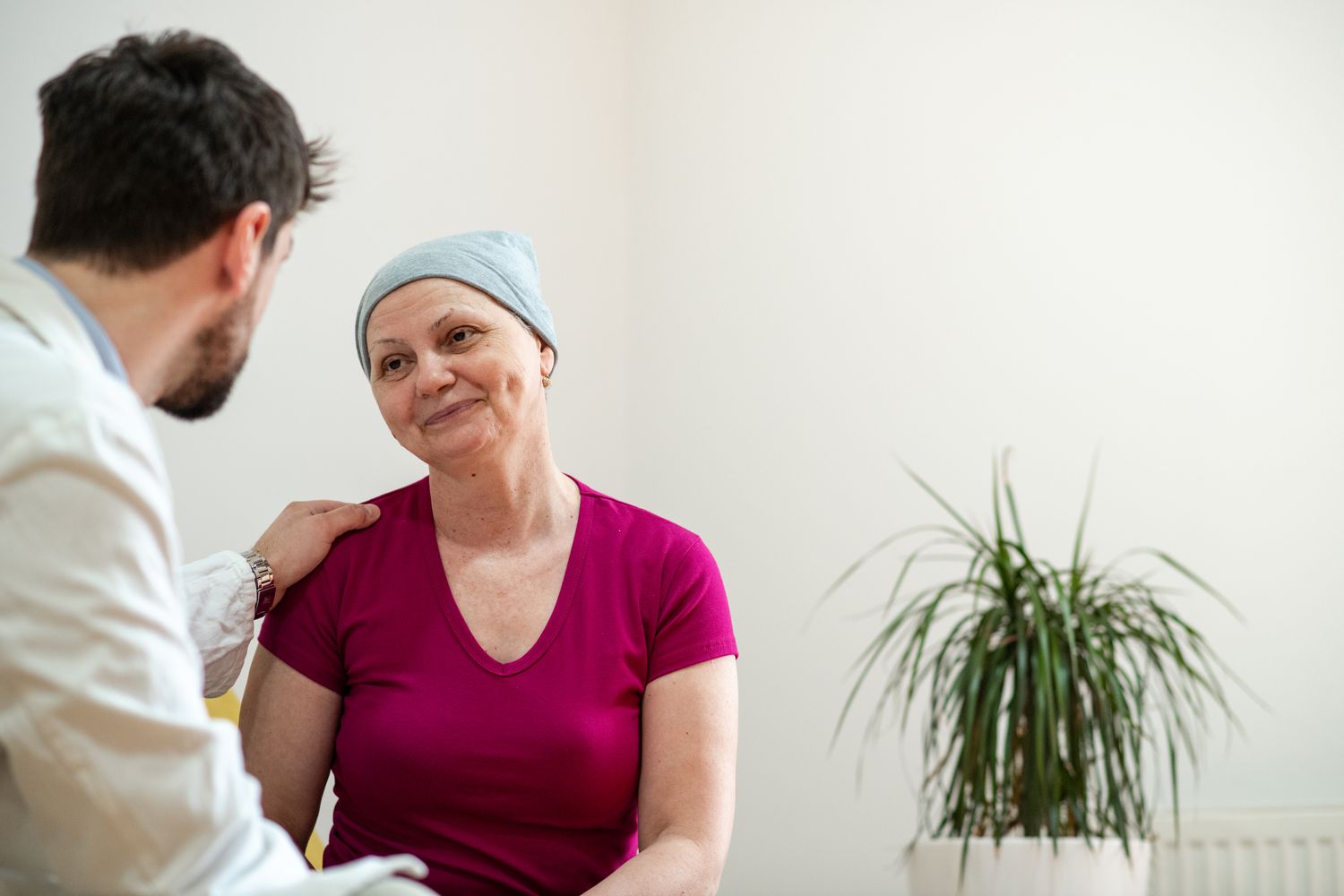 person with pancreatic cancer talking to doctor