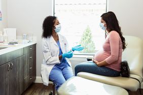 Pregnant woman at the gynecologist getting a check up