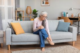 older adult experiencing peripheral neuropathy foot pain