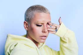TikTok Bandaid Pimple Trend , Young woman with band aid