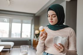 person taking antibiotics to treat staph infection