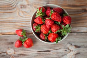 View from the top of a bowl of ripe strawberries