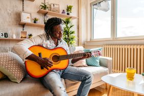 managing stress by playing the guitar