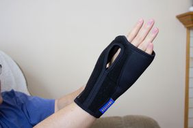 Person wearing carpal tunnel brace on right wrist