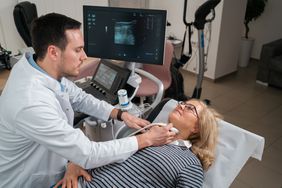 person getting thyroid biopsy to test for cancer