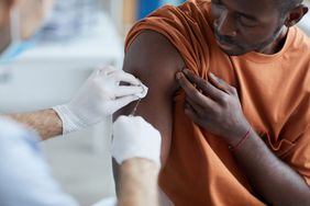 African-American man getting covid vaccine close-up