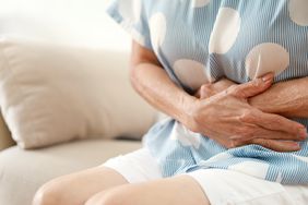 older person with vaginal cancer experiencing pelvic and stomach pain