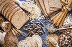 Top view of wholegrain and cereal composition shot on rustic wooden table. 